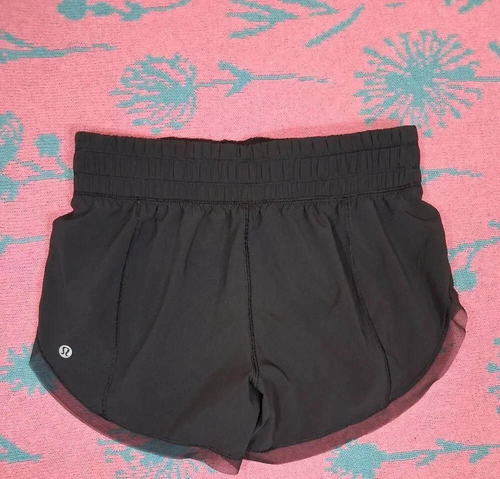 Lululemon womens size 4 mesh hem black running shorts gym Activewear athletic
